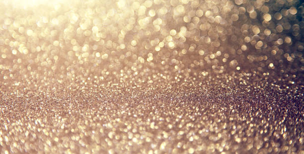 istock Sparkling lights, bokeh festive background with texture. 1290178112