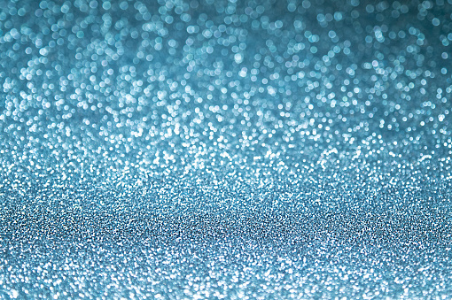1273948646 istock El fondo de las luces de desenfoque azul brillante festivo con textura abstracta, enfoque selectivo. 1290179217