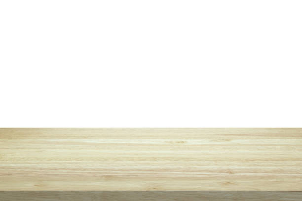 istock Empty wooden table top isolated on white background for product display montage 1290179327