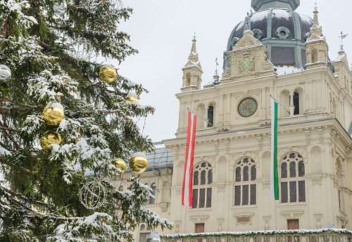 Beautiful Christmas tree and Town Hall building at famous main square Hauptplatz , in winter, in the city center of Graz, Styria region, Austria. Selective focus