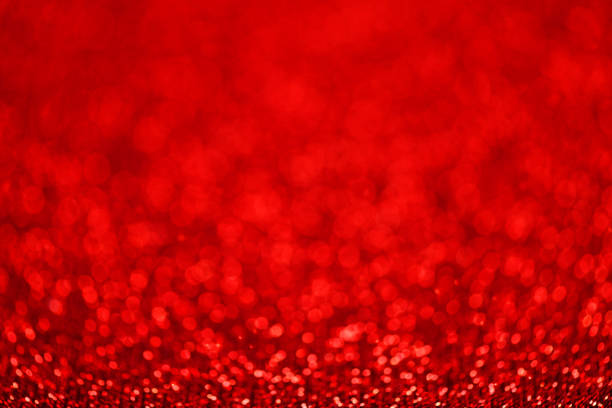 istock Crimson bokeh abstract background, red defocused texture for Christmas greeting card 1290185283