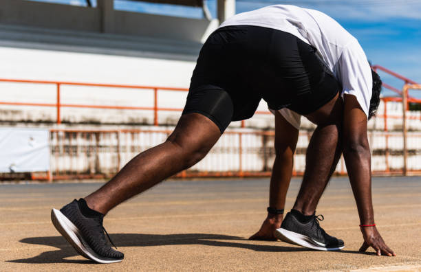 istock sport runner black man active ready to start running training 1290189572