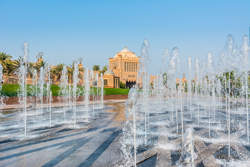 Fountain and background of main gate of Emirates palace United Arab Emirates.