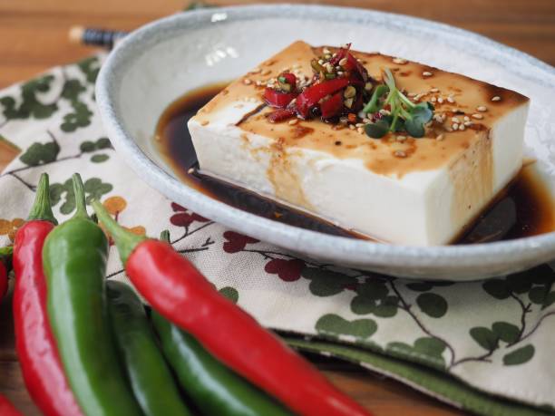 Asian food soft tofu and Soy sauce