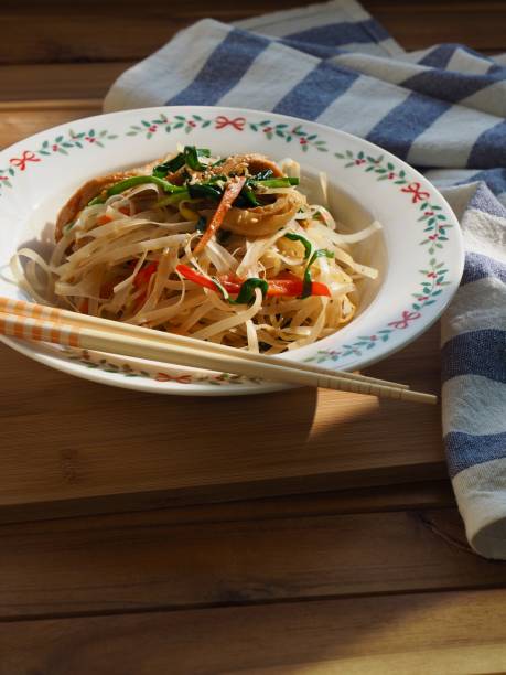 istock Asian food stir-fried rice noodles with vegetables 1290197780