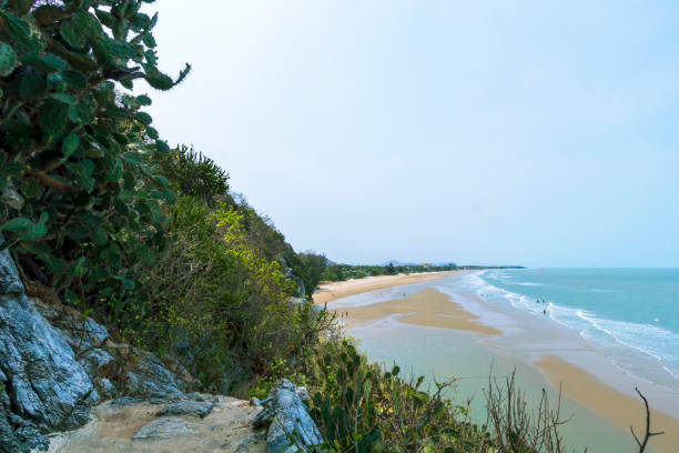 istock Sea views with beaches and mountains under a clear sky. 1290198460