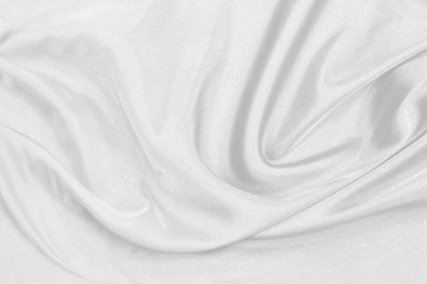 istock Smooth elegant white silk fabric or satin luxury cloth texture can use as wedding background. for drapery luxurious abstract design 1290198563