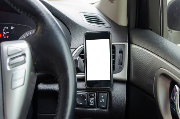 istock Mobile phone in the car 1290198617