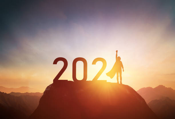 child standing on the mountain with 2021