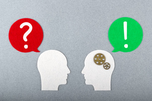 istock People profiles and message icons with question and exclamation mark on gray background. Concept conflict management. 1290203571