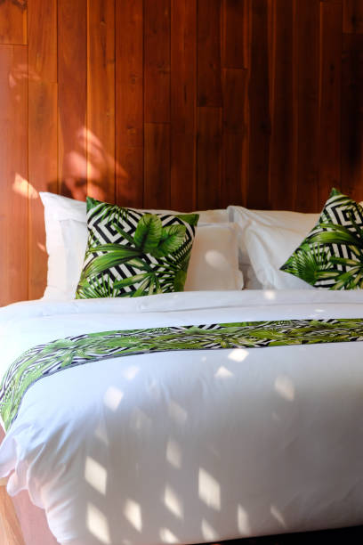istock Modern white bed and pillow in the morning mood 1290206965