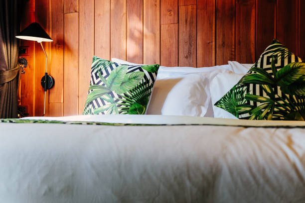 istock Modern white bed and pillow in the morning mood 1290206980