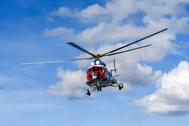 Photo of The civil helicopter over the sea