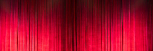 istock Red Curtain close before theatre drama begin 1290213770