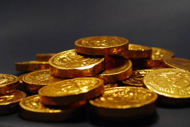 istock Gold coin chocolate food replica 1290214318