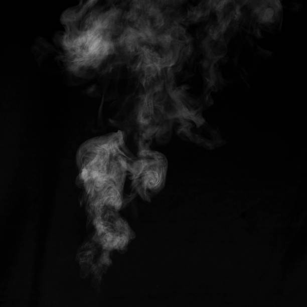 istock White smoke on black background. Figured smoke on a dark background. Abstract background, design element 1290216247