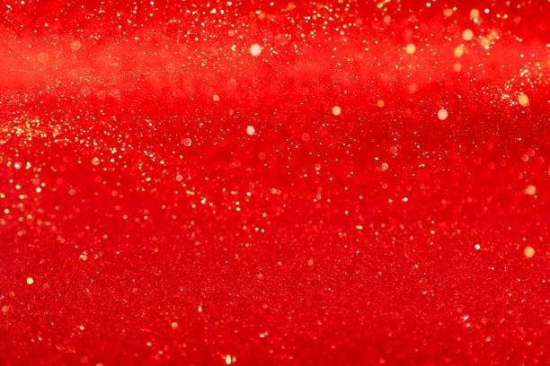 istock Festive shine red background holiday light Christmas. 1290217500
