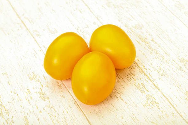 Few Yellow ripe tasty tomatoes vegetables