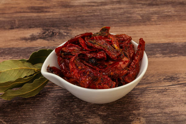 istock Dry tomato heap in the bowl 1290223716