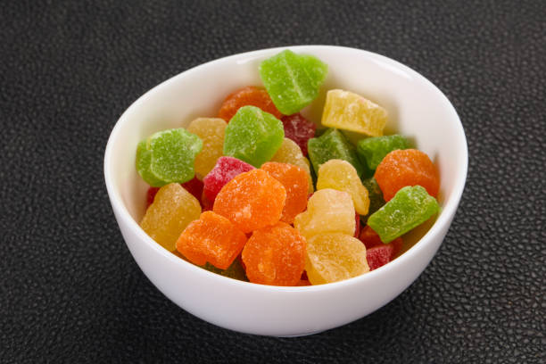 Sweet candied fruit heap in the bowl