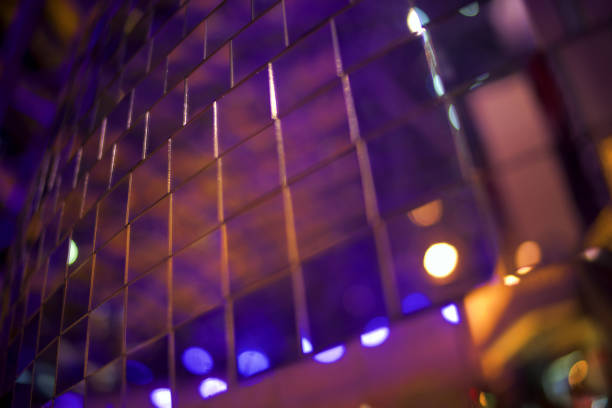 A disco mirror ball. Big city lights.