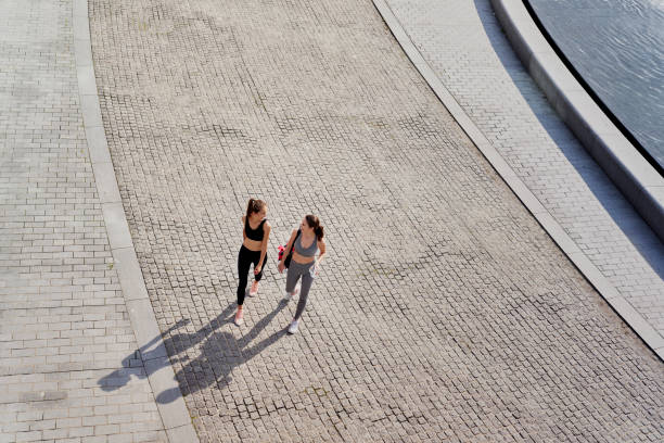 istock Top view of two happy women going in training 1290225512