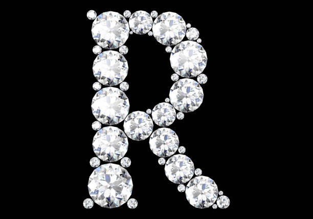 istock Diamond letters with gemstones isolated on black. 3D rendering 1290229005