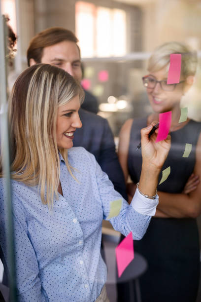 istock Business people working as a team at the office 1290230255