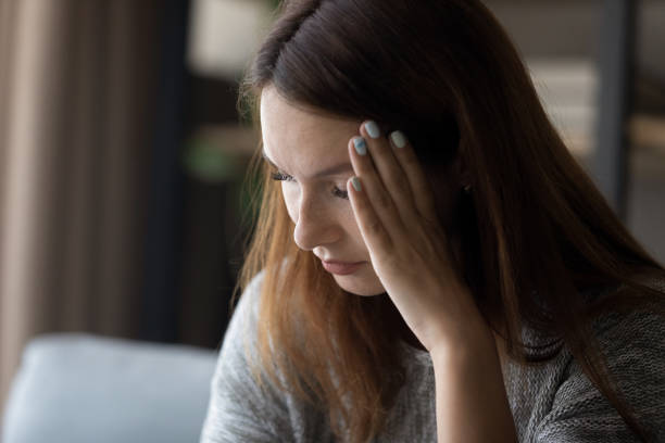 istock Depressed young caucasian woman having psychological problems. 1290230581