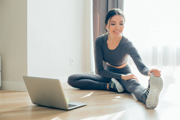 istock Practicing yoga with online lessons is pleasant and easy 1290234361