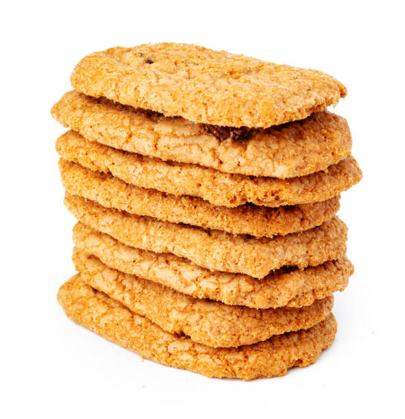 istock Stack of oat cookies isolated on white background 1290235078