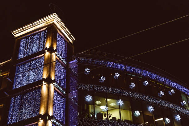 office building tower christmas decoration illumination work on the weekends job