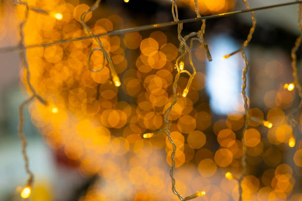istock Selective focus on LED Christmas lights. Magical New Year's lighting. 1290237420