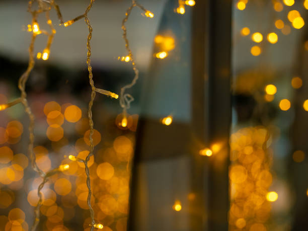 istock Selective focus on LED Christmas lights. Magical New Year's lighting. 1290237423
