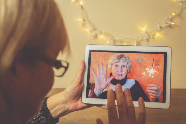 istock Remote conversation with old mother on Christmas 1290242994