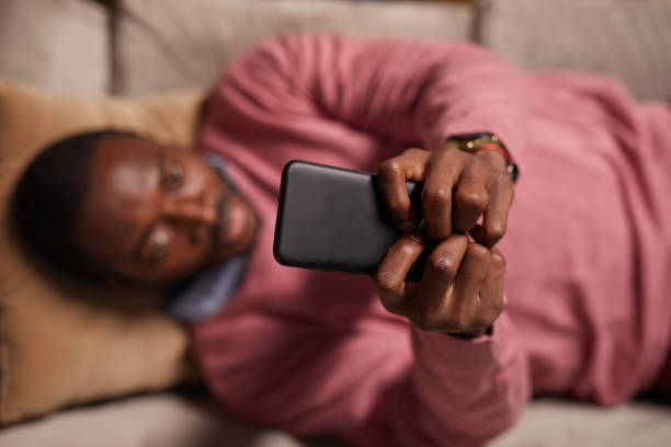 istock Man typing on the phone 1290244212