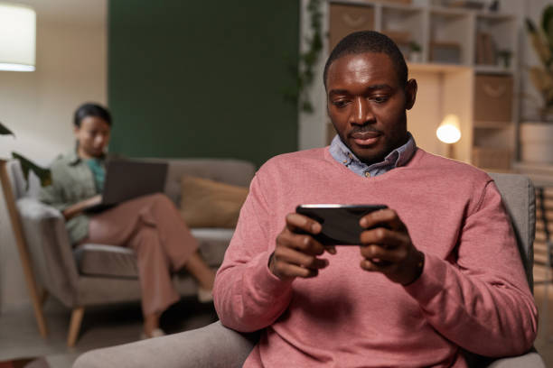 istock Man playing on the phone 1290244232