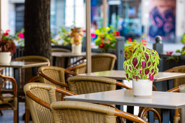 istock empty tables and chairs at a street cafe 1290244339