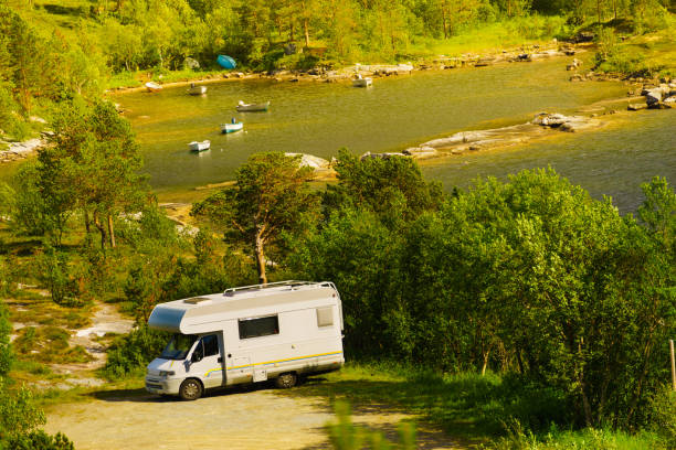 istock Camper car camp on norwegian nature 1290246125