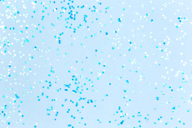 istock Blue background with sequins. Suitable for backdrop for your design. Top view, copy space 1290247514