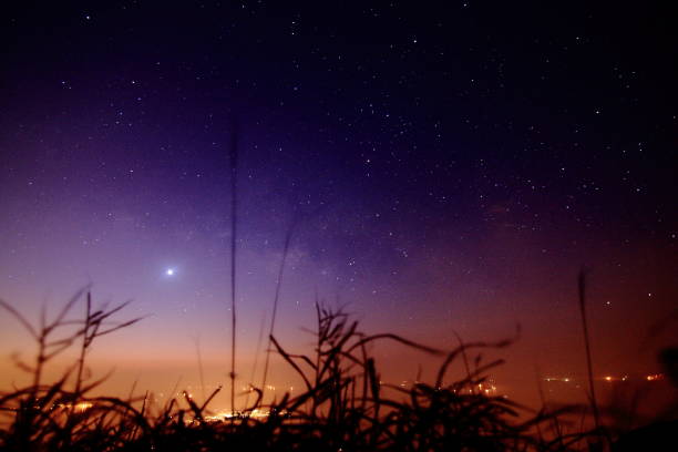 The Southern Lights - Aurora Australis and the night sky filled with stars in Blayney, Central West, NSW, Australia.