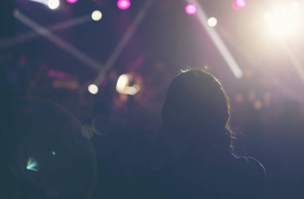 istock Concert Dark background, smoke, spotlights. Bright lights 1290250065
