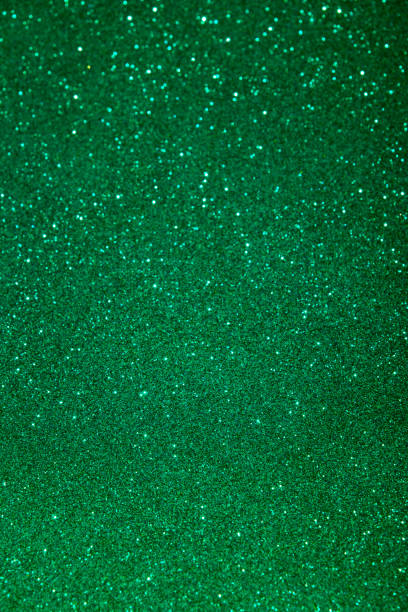 istock Green color blured sparkling background with focused area. 1290251472