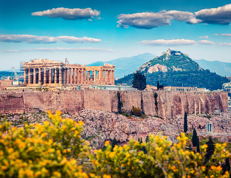 Great spring view of Parthenon, former temple, on the Athenian Acropolis, Greece, Europe. Colorful morning scene in Athens. Traveling concept background. Artistic style post processed photo.