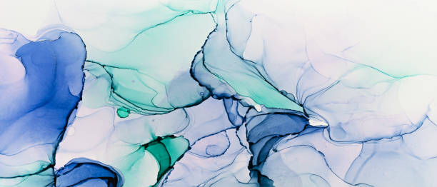 istock Closeup of blue and turquoise alcohol ink abstract texture 1290253130