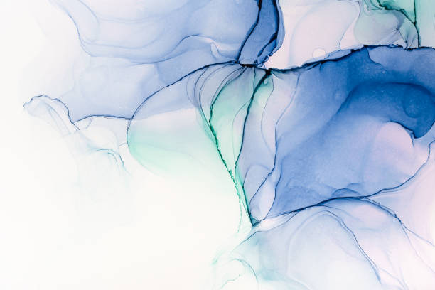 istock Closeup of blue and turquoise alcohol ink abstract texture 1290253137