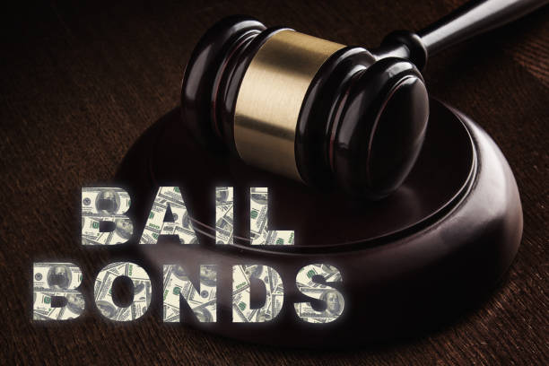Judge gavel and Bail Bonds services concept Bail bonds services concept. Judge gavel on wooden background. bounty hunter stock pictures, royalty-free photos & images