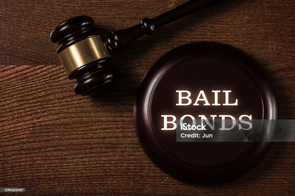Judge gavel and Bail Bonds services concept Bail bonds services concept. Judge gavel on wooden background. Bail Stock Photo