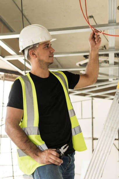 istock Electrician cutting wires during his work 1290254336