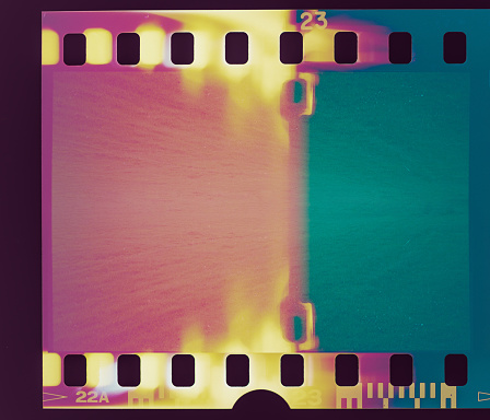 Old Developed Film Light Leaks from A film camera. Expired and developed film from vintage camera, with a lot of dust, scratches and light leaks.